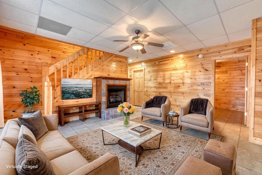 180 Shepherds Ridge Morganton, GA 30560 - Photo 6 of 66 a living room with furniture fireplace and a flat screen tv