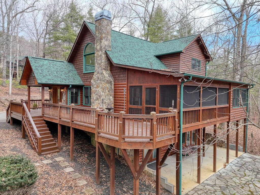 180 Shepherds Ridge Morganton, GA 30560 - Photo 9 of 66 a view of house with outdoor seating yard and wooden fence