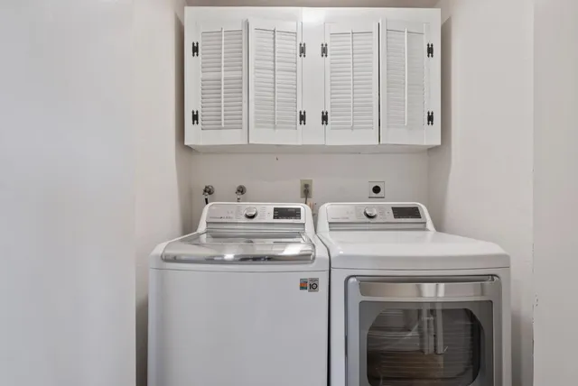 a view of a house with backyard sitting area and garden