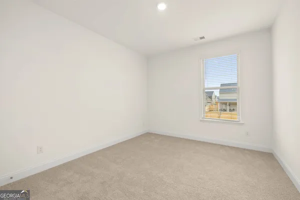 an empty room with a window