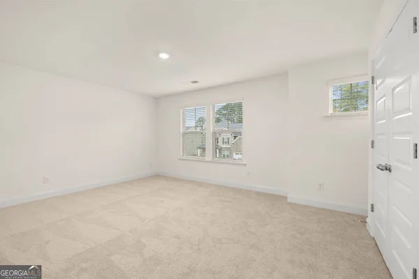 an empty room with windows