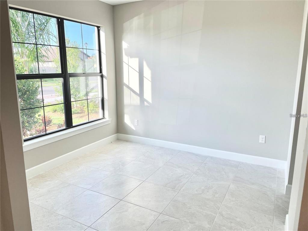 5748 Bay Pine Way Sarasota, FL 34238 - Photo 13 of 24 an empty room with a window