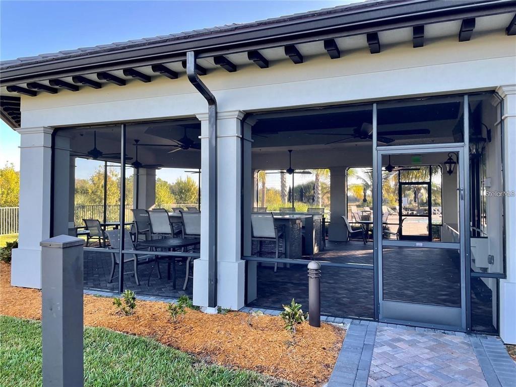 5748 Bay Pine Way Sarasota, FL 34238 - Photo 22 of 24 a room with furniture and a table