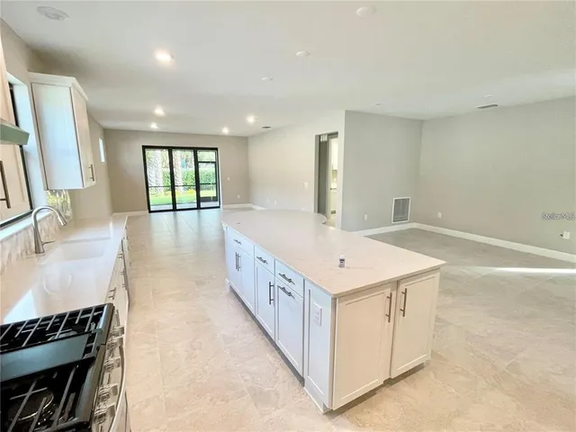 a bathroom with a sink and a bathtub