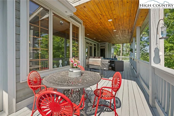a bathroom with a sink toilet vanity and shower