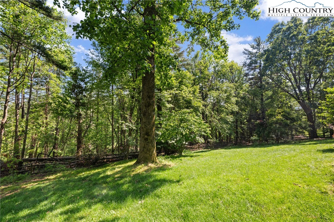 128 East Pinecrest Court Boone, NC 28607 - Photo 41 of 46 a view of an outdoor space and a yard