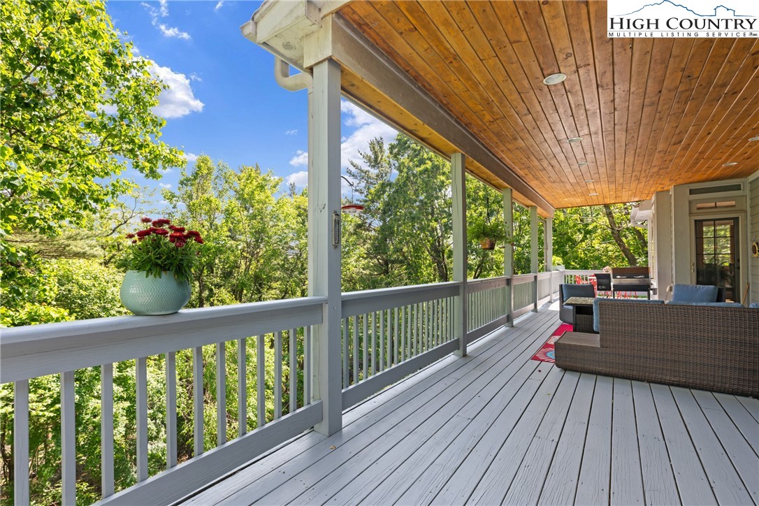 128 East Pinecrest Court Boone, NC 28607 - Photo 8 of 46 a view of balcony with wooden floor