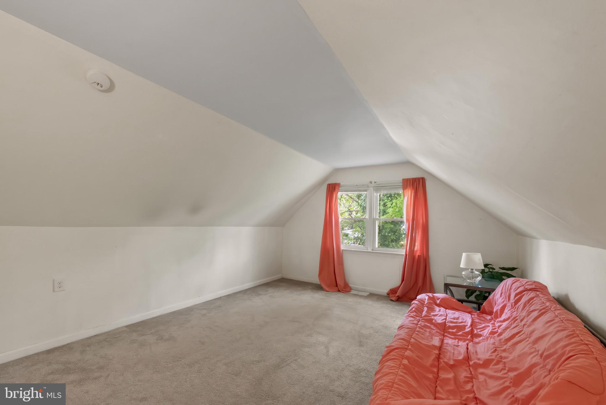 735 Cliffedge Road Baltimore, MD 21208 - Photo 21 of 39 a view of an empty room and window