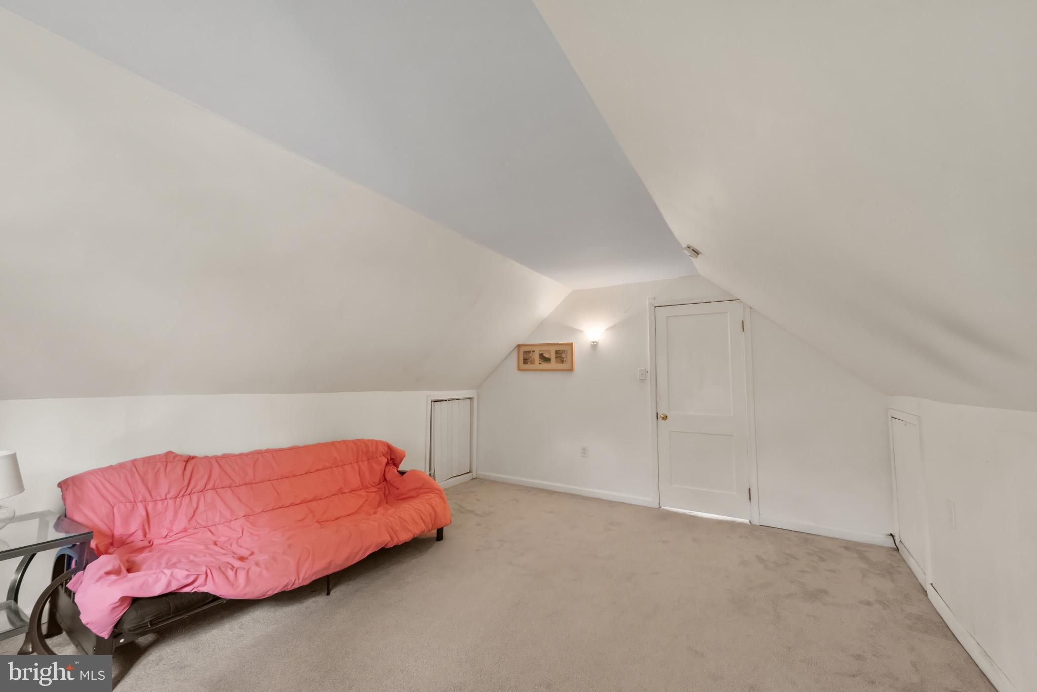 735 Cliffedge Road Baltimore, MD 21208 - Photo 22 of 39 a bedroom with a bed and closet