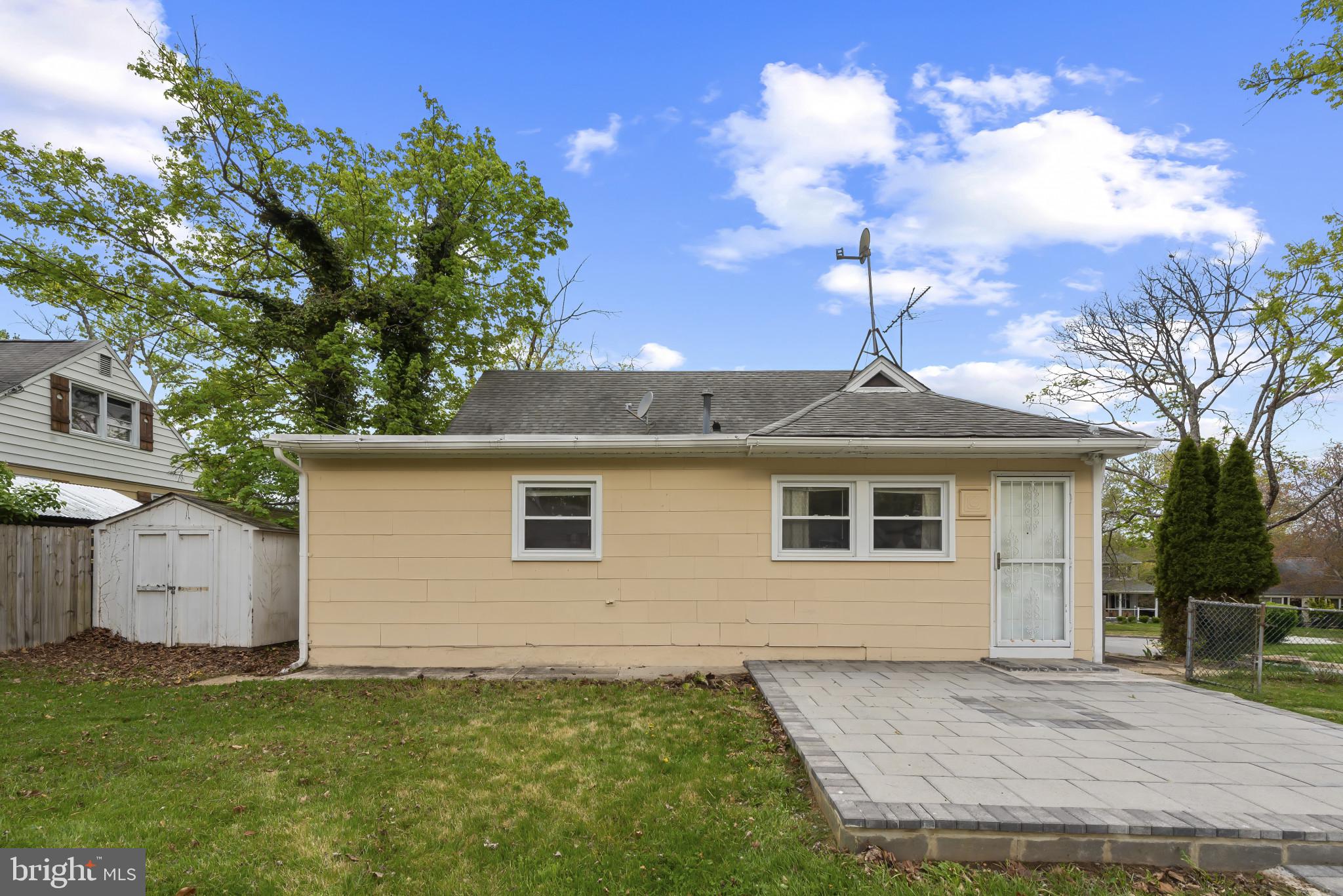 735 Cliffedge Road Baltimore, MD 21208 - Photo 33 of 39 a front view of a house with a yard