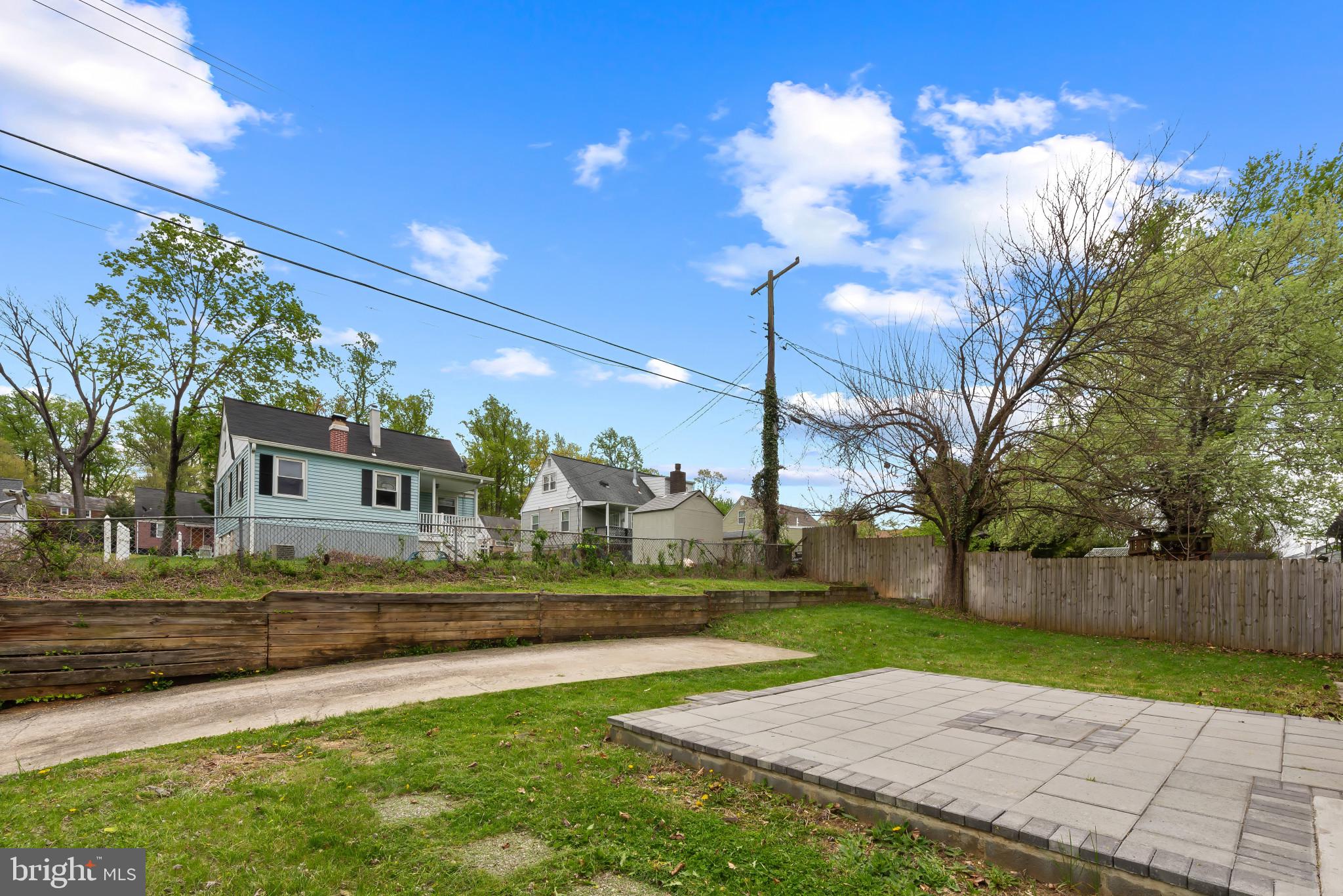 735 Cliffedge Road Baltimore, MD 21208 - Photo 36 of 39 a view of a house with a yard