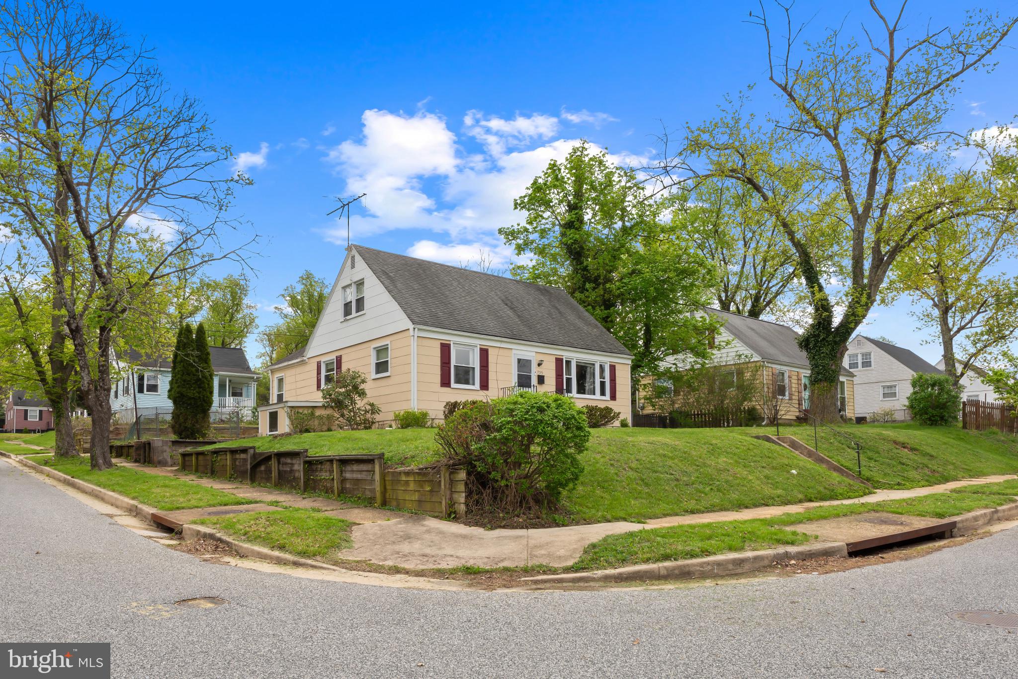 735 Cliffedge Road Baltimore, MD 21208 - Photo 39 of 39 a house view with a garden space