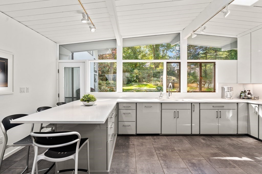 83 Ridgeway Road Weston, MA 02493 - Photo 13 of 32 a kitchen with a sink and a stove