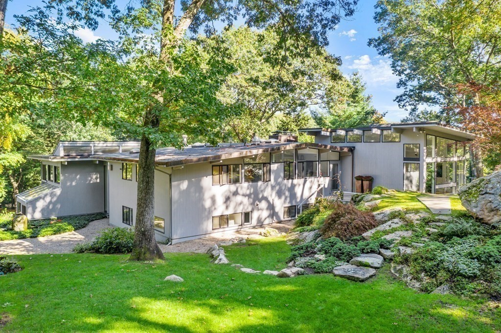 83 Ridgeway Road Weston, MA 02493 - Photo 26 of 32 a view of a house with a yard and a large tree