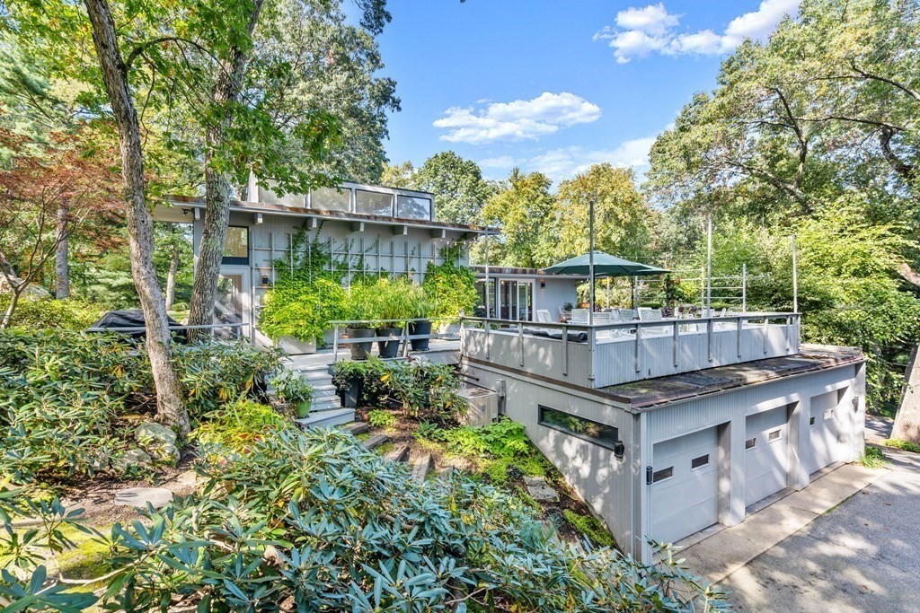 83 Ridgeway Road Weston, MA 02493 - Photo 31 of 32 a view of a backyard with sitting area