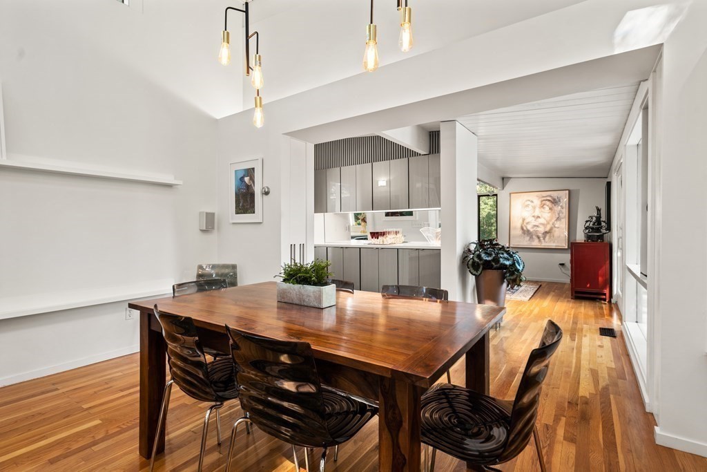 83 Ridgeway Road Weston, MA 02493 - Photo 7 of 32 a view of a dining room with furniture and wooden floor