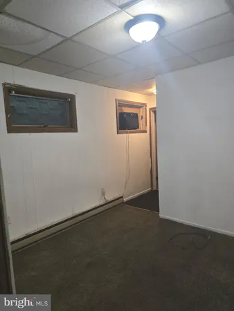 an empty room with a hallway