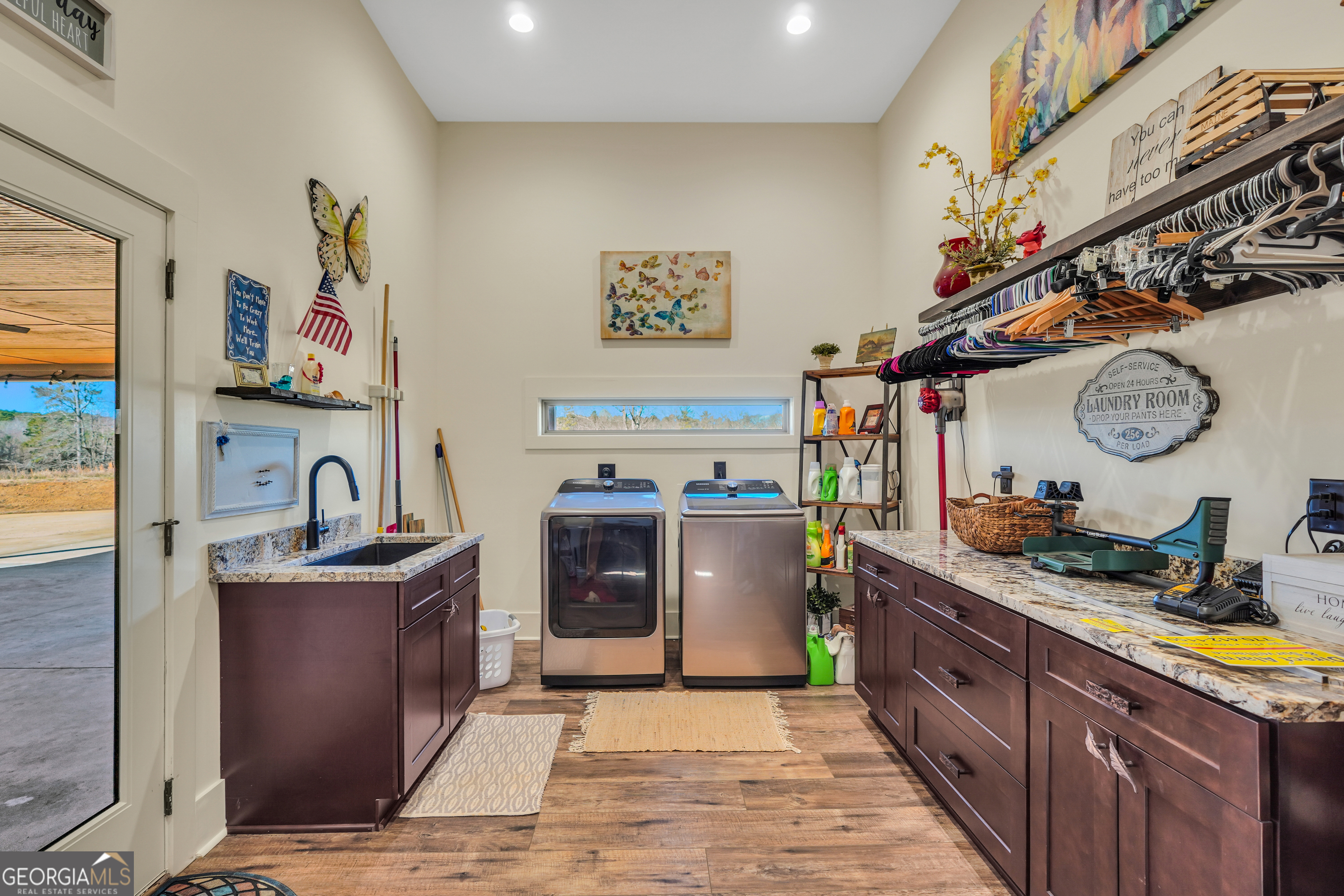 616 Shackelford Road Griffin, GA 30224 - Photo 41 of 64 a kitchen with stainless steel appliances granite countertop a stove and cabinets