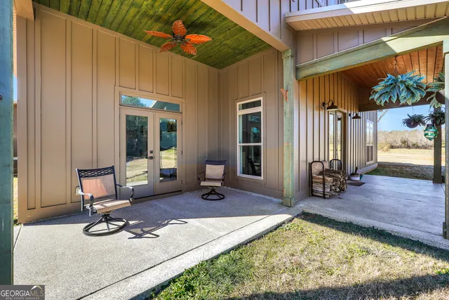 an aerial view of a residential apartment building with a yard