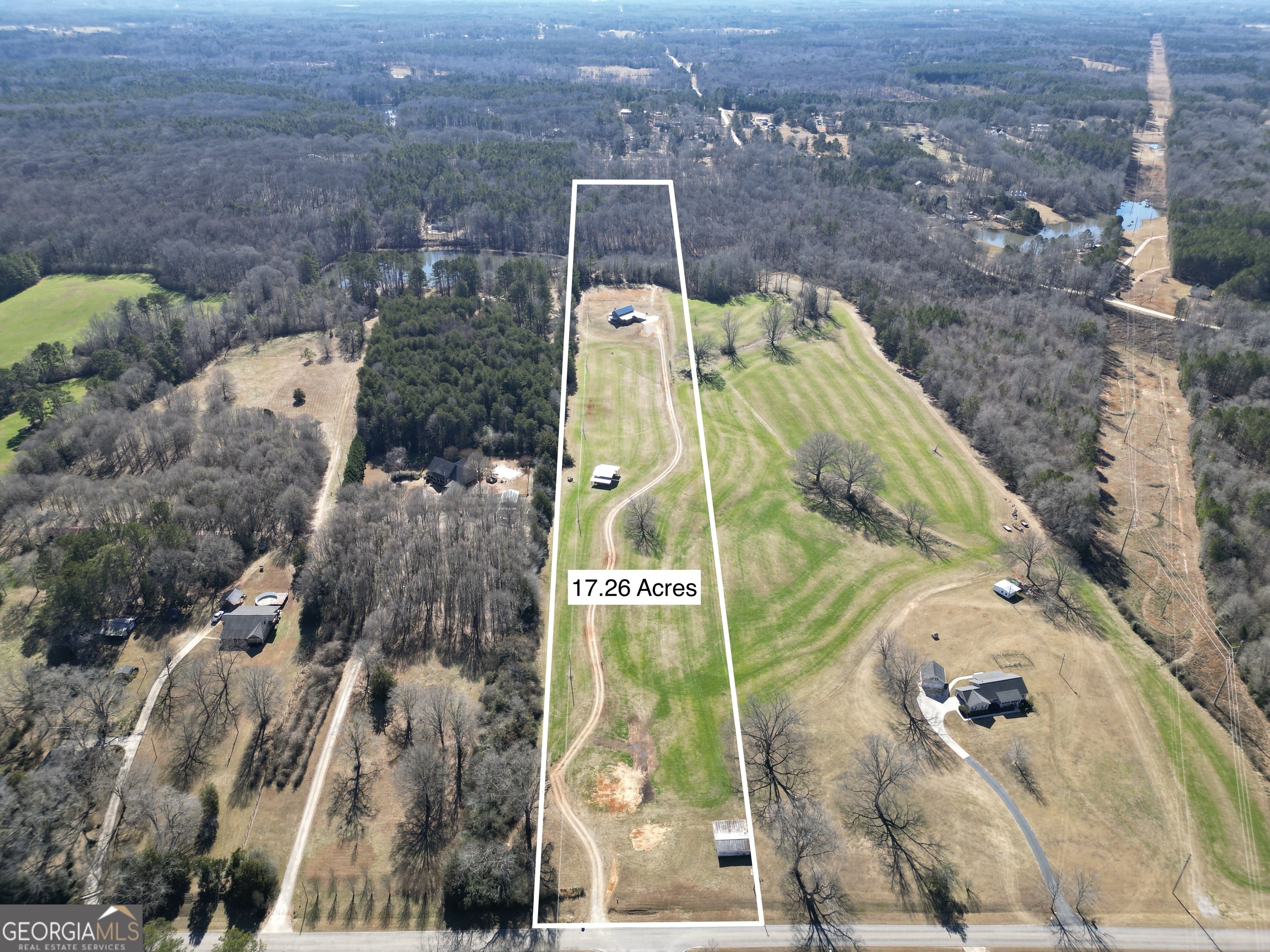 616 Shackelford Road Griffin, GA 30224 - Photo 56 of 64 an aerial view of a residential apartment building with a yard