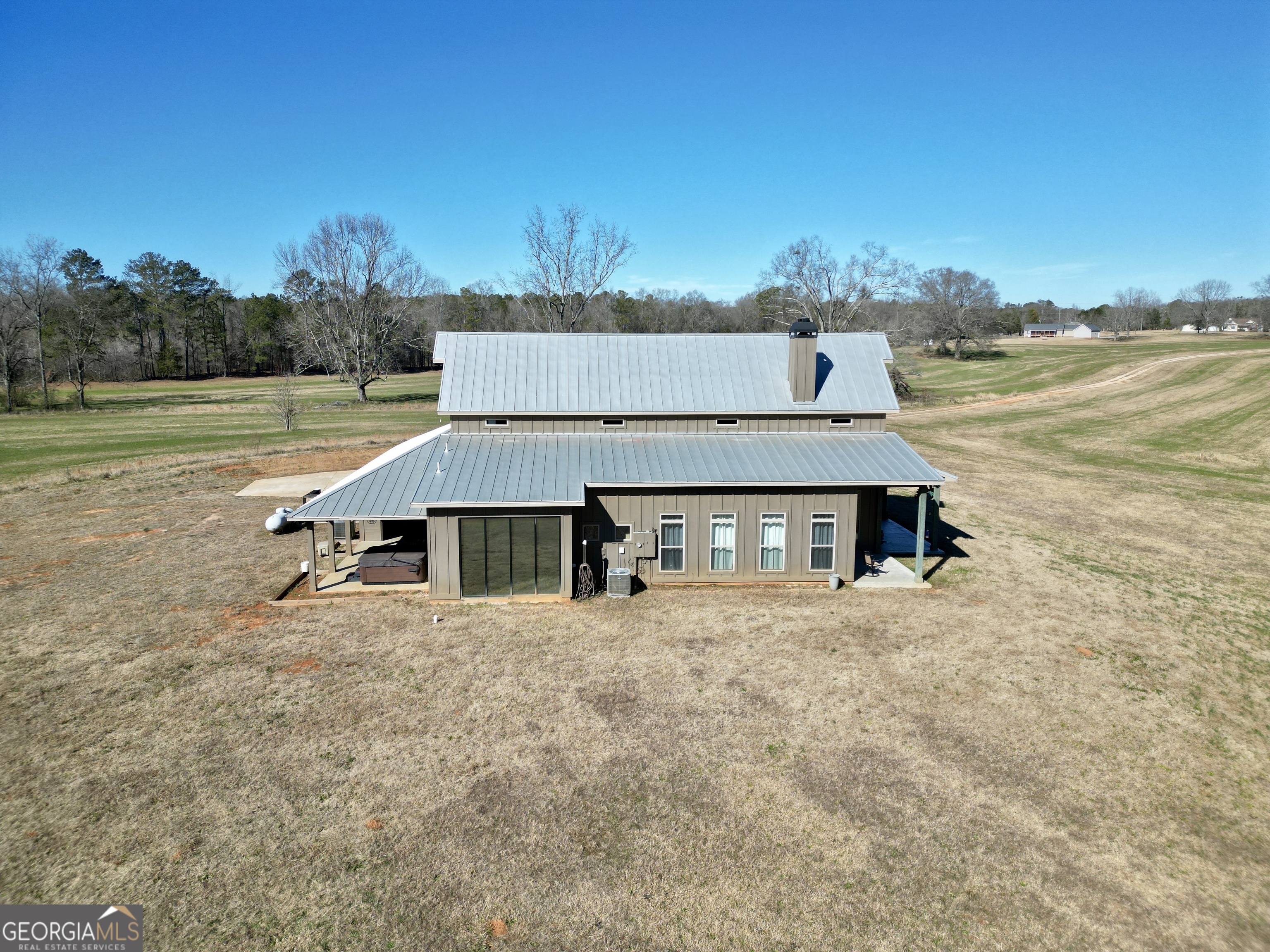 616 Shackelford Road Griffin, GA 30224 - Photo 59 of 64 an aerial view of a house with big yard and large tree