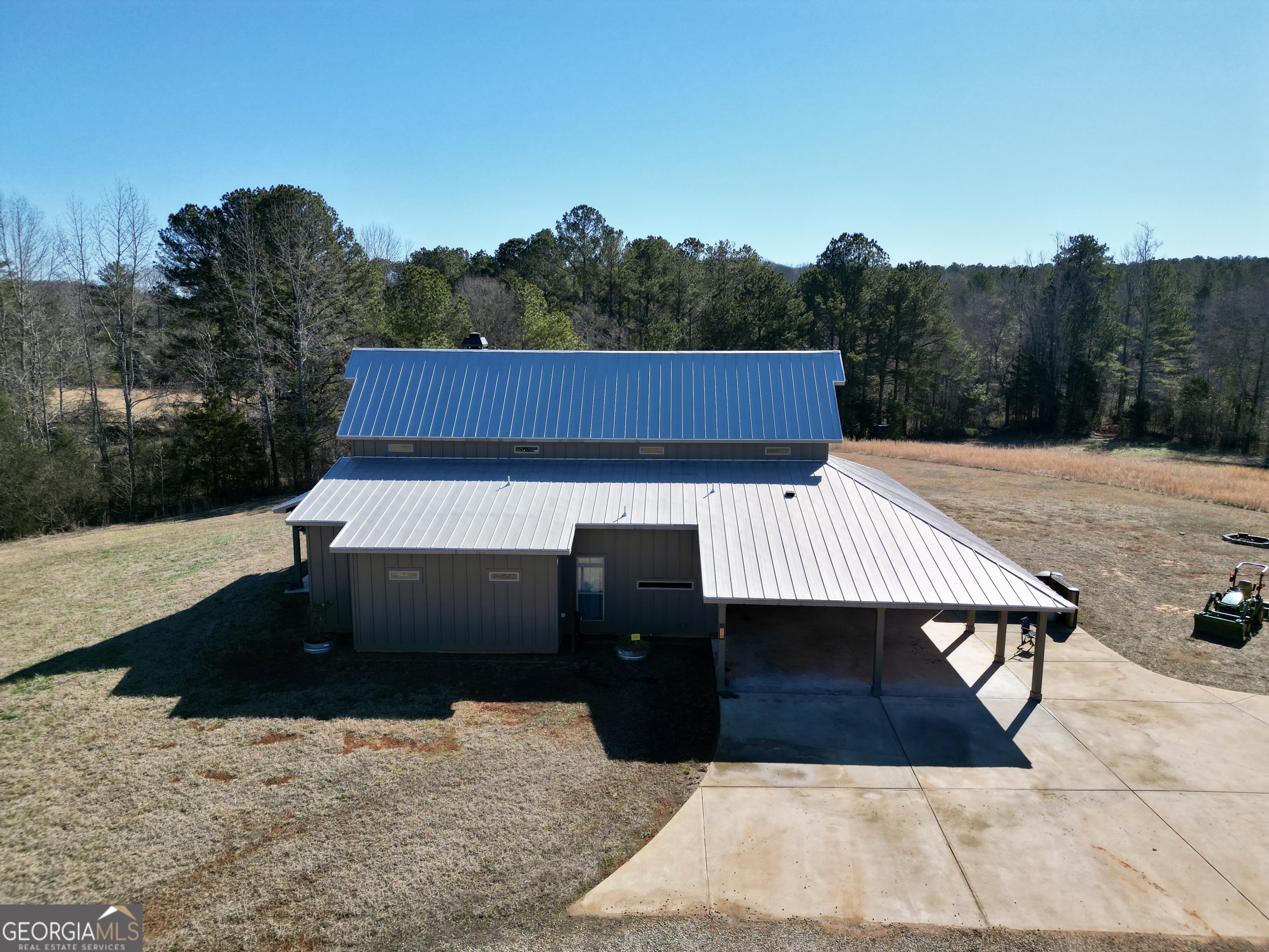 616 Shackelford Road Griffin, GA 30224 - Photo 60 of 64 a view of a terrace with a bench