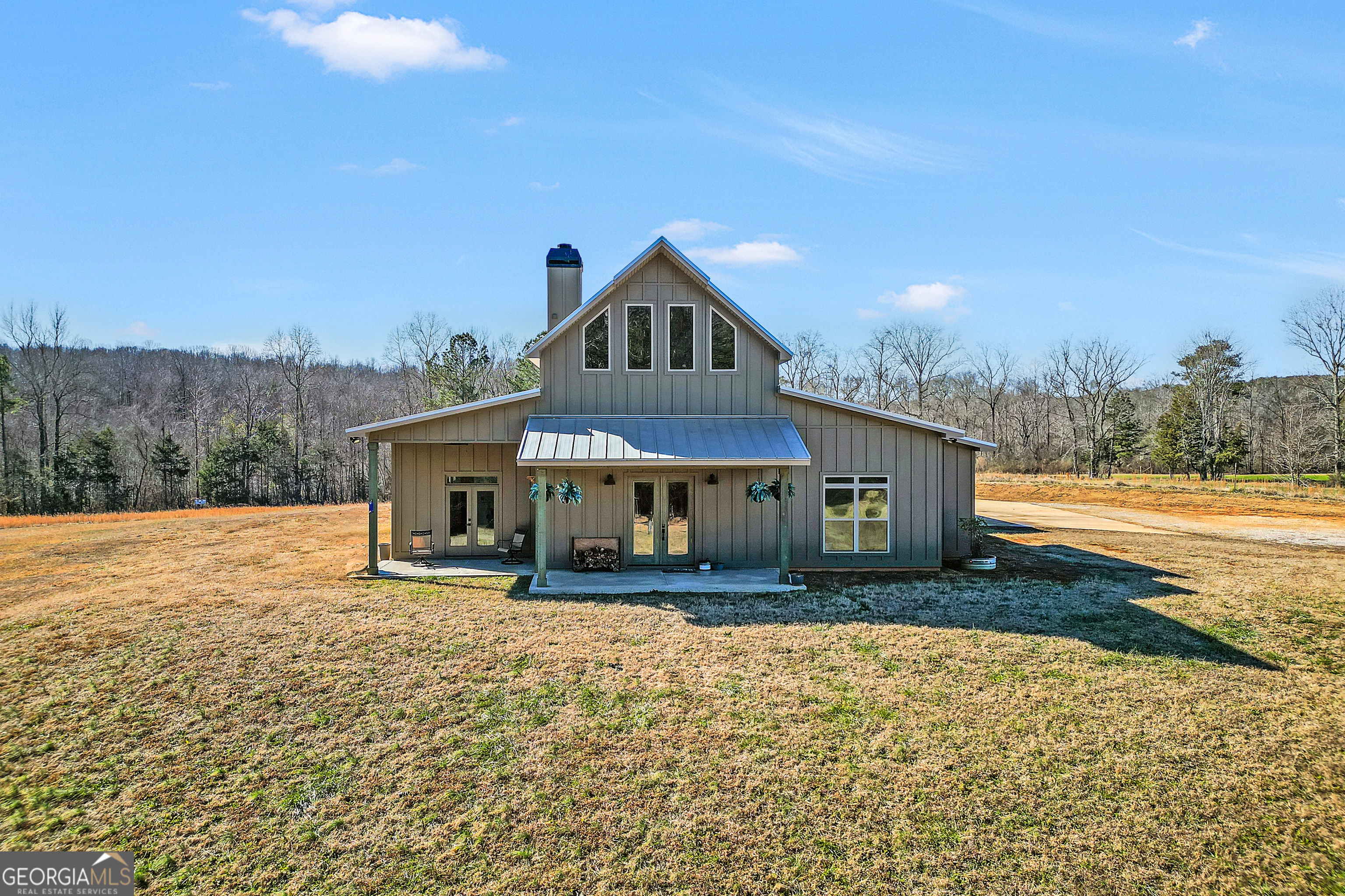 616 Shackelford Road Griffin, GA 30224 - Photo 7 of 64 a front view of a house with a yard