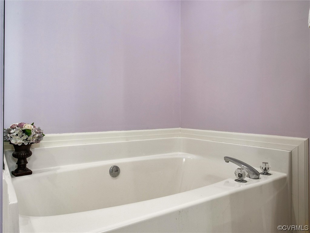 9508 Meadowview Road Henrico, VA 23294 - Photo 25 of 34 a bathroom with a bathtub