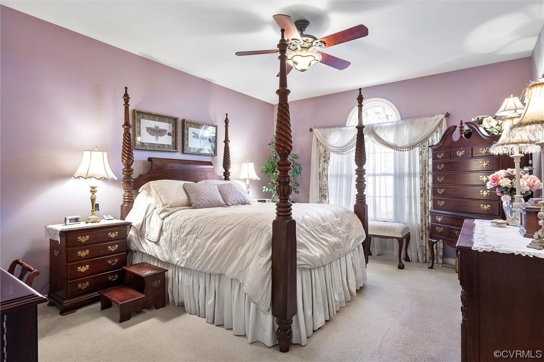 9508 Meadowview Road Henrico, VA 23294 - Photo 32 of 34 a bed room with a bed mirror and a window