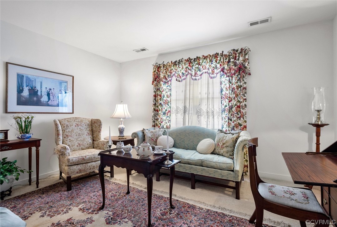 9508 Meadowview Road Henrico, VA 23294 - Photo 9 of 34 a living room with furniture and a large window