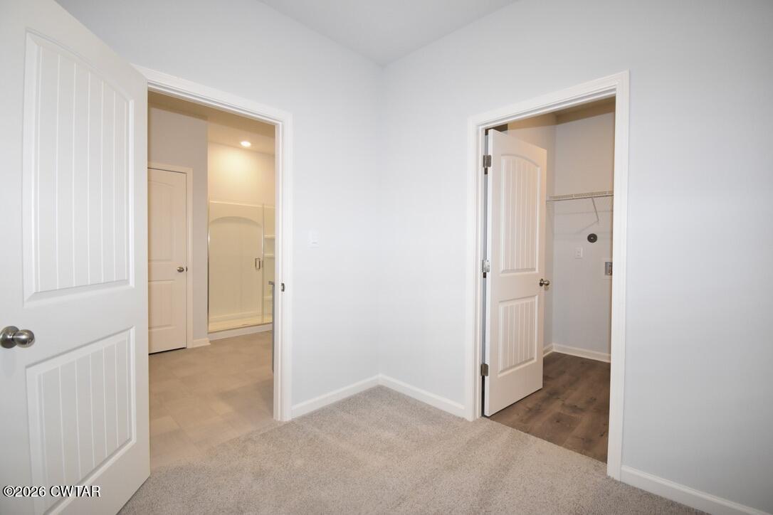 108 Gateway Drive Jackson, TN 38305 - Photo 12 of 21 an empty room that has a wooden door
