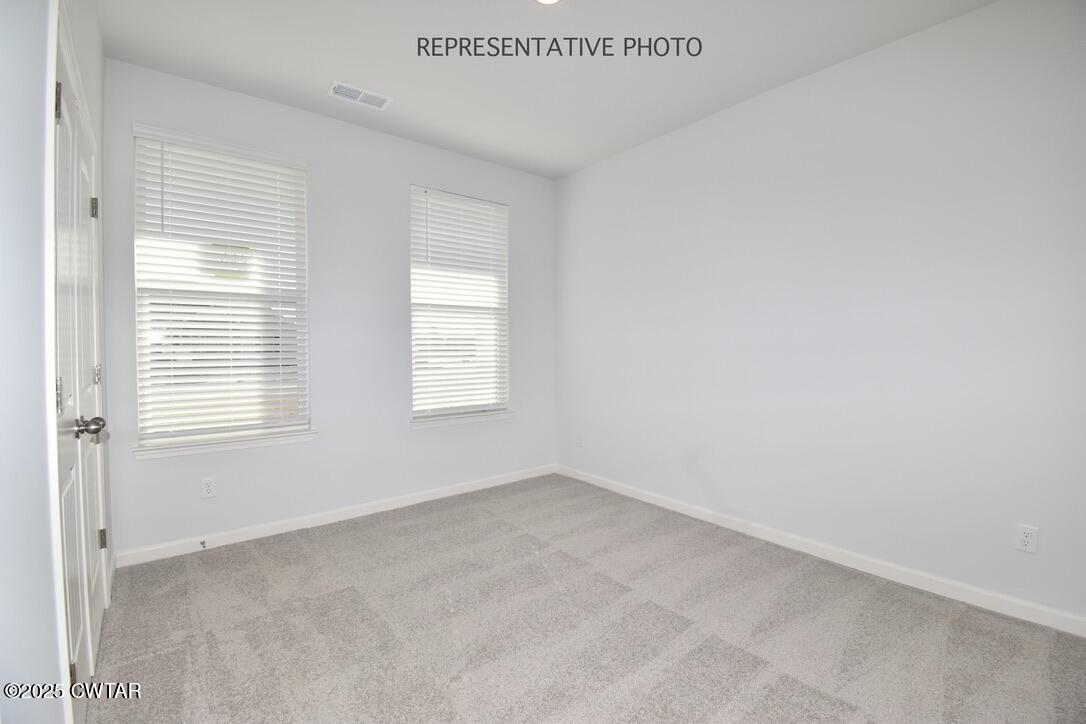 108 Gateway Drive Jackson, TN 38305 - Photo 13 of 19 a view of an empty room with a window