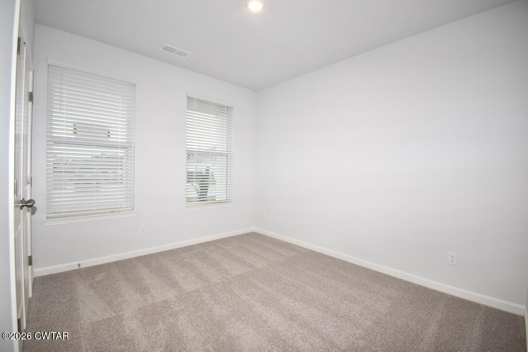 108 Gateway Drive Jackson, TN 38305 - Photo 14 of 21 a view of an empty room with a window