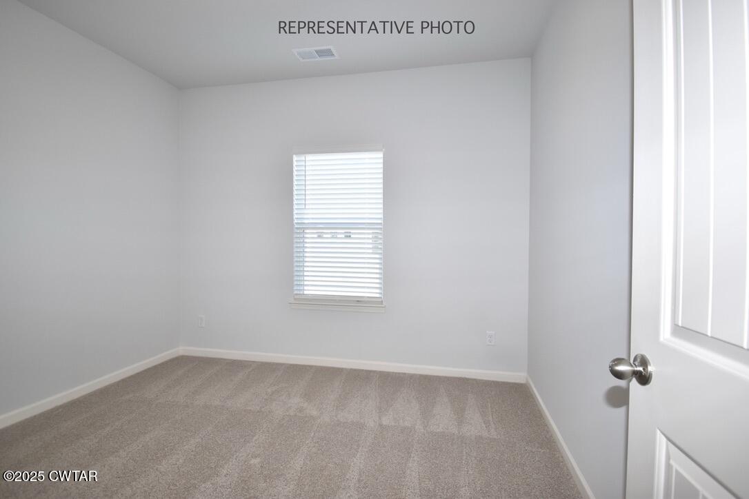 108 Gateway Drive Jackson, TN 38305 - Photo 17 of 19 a view of a room that has a window in it