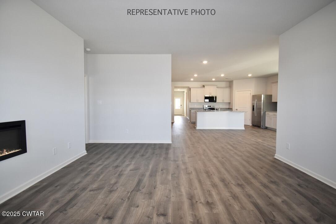 108 Gateway Drive Jackson, TN 38305 - Photo 6 of 19 a view of a kitchen with a sink and a refrigerator