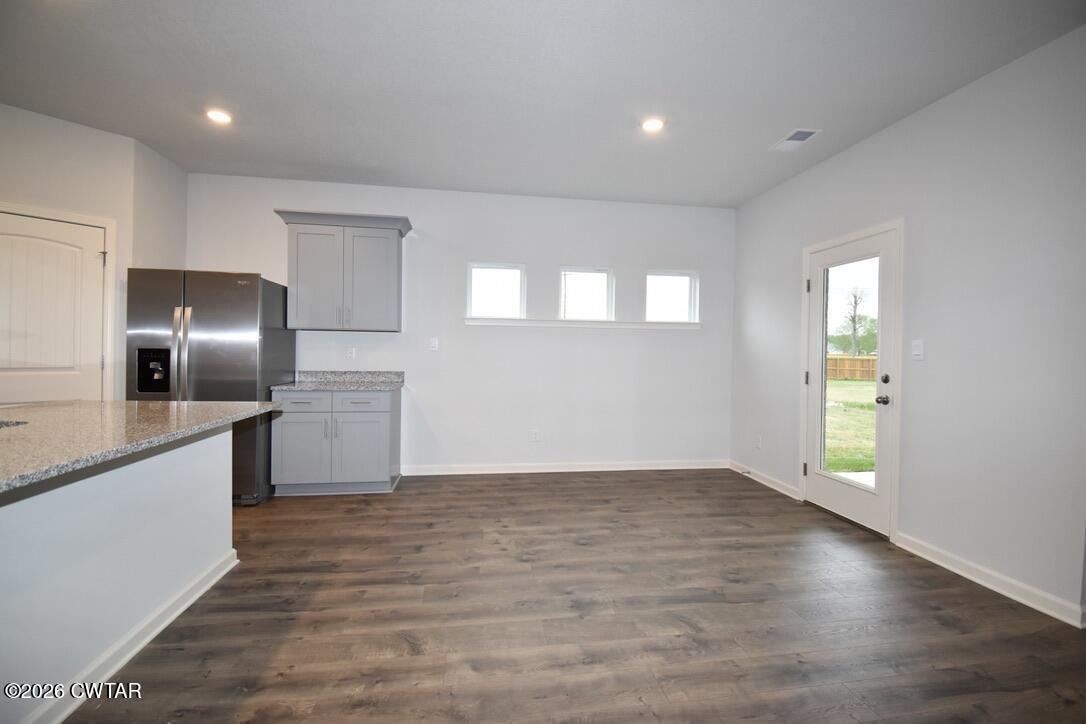 108 Gateway Drive Jackson, TN 38305 - Photo 6 of 21 a view of a kitchen with a sink and an empty room