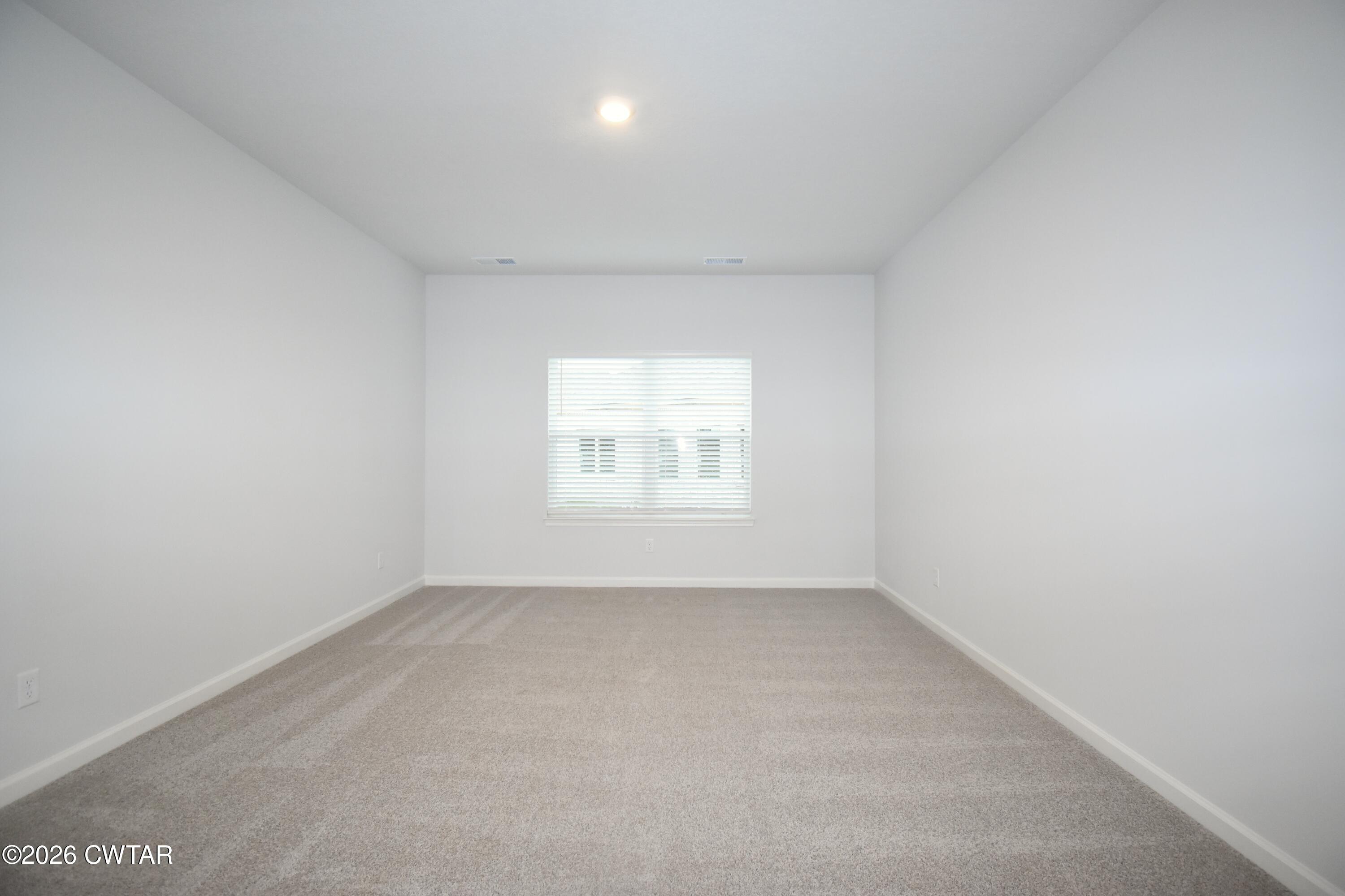 108 Gateway Drive Jackson, TN 38305 - Photo 9 of 21 an empty room with a window