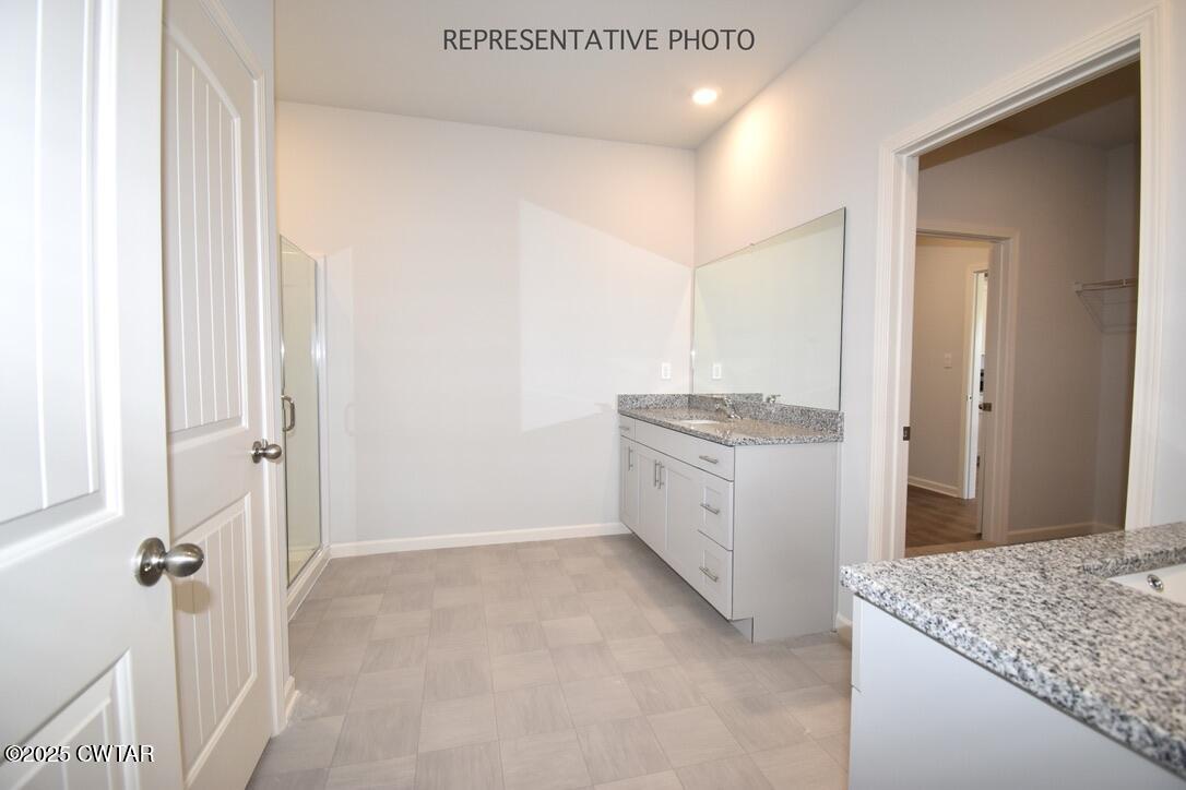 108 Gateway Drive Jackson, TN 38305 - Photo 10 of 19 a view of a kitchen cabinets and wooden floor