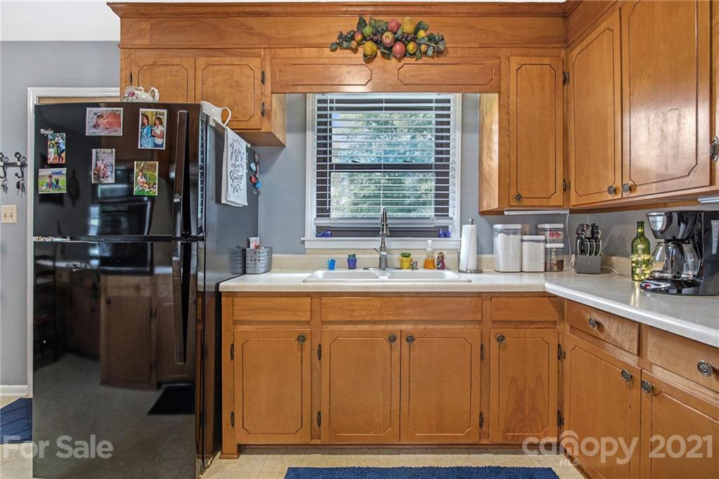 4025 Fallston Road Shelby, NC 28150 - Photo 11 of 29 a kitchen with cabinets and window