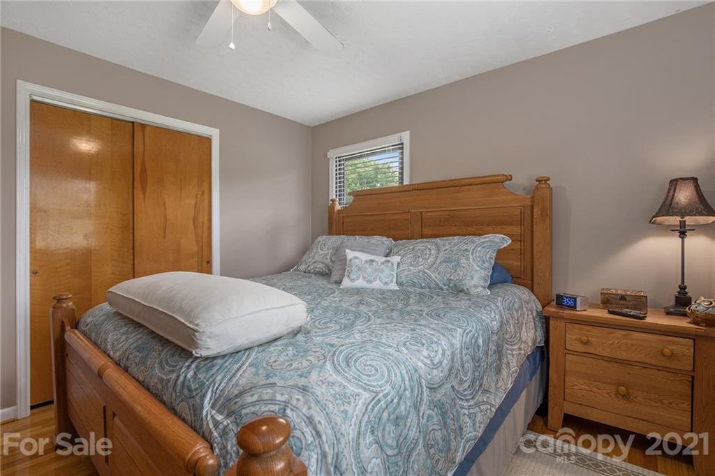 4025 Fallston Road Shelby, NC 28150 - Photo 20 of 29 a bedroom with a bed and a mirror