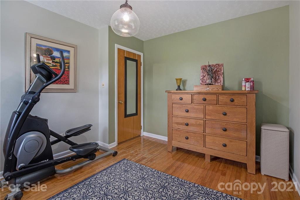 4025 Fallston Road Shelby, NC 28150 - Photo 23 of 29 a room with furniture and wooden floor