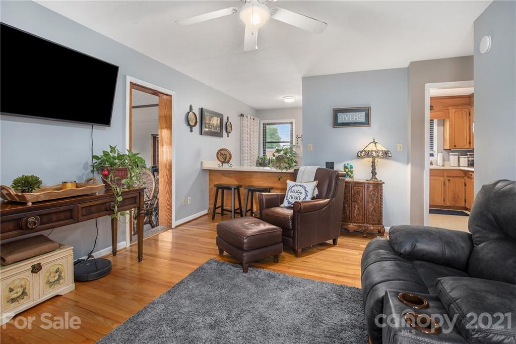 4025 Fallston Road Shelby, NC 28150 - Photo 4 of 29 a living room with furniture and a flat screen tv