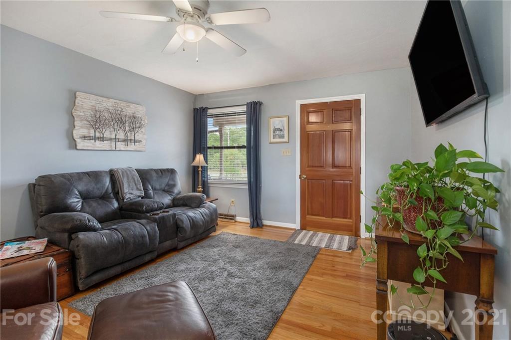 4025 Fallston Road Shelby, NC 28150 - Photo 6 of 29 a living room with furniture and a flat screen tv