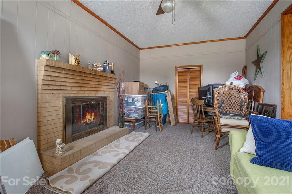 4025 Fallston Road Shelby, NC 28150 - Photo 7 of 29 a living room with furniture and a fireplace
