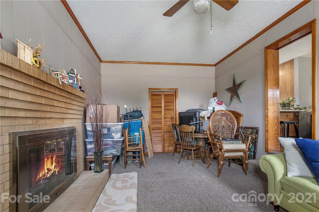 4025 Fallston Road Shelby, NC 28150 - Photo 8 of 29 a living room with furniture and a fireplace