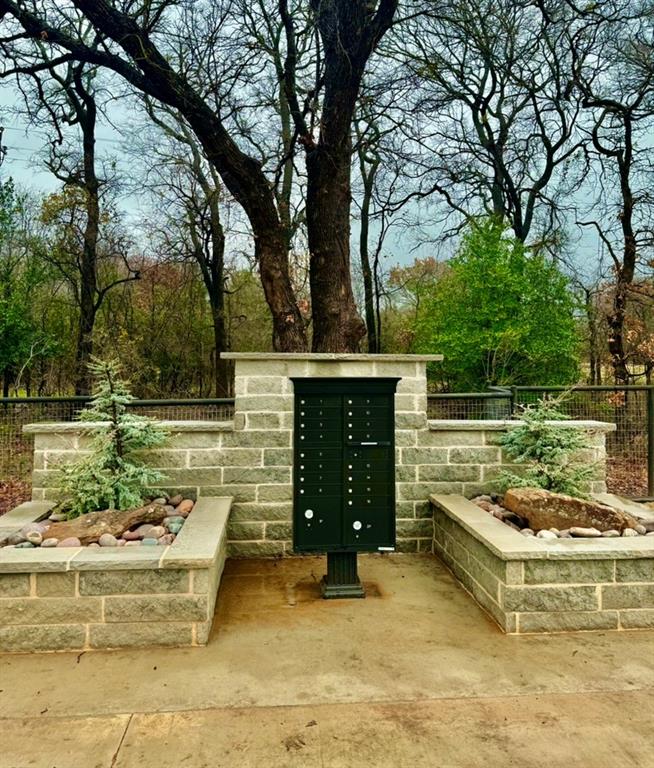 549 Tradition Way Granbury, TX 76049 - Photo 5 of 5 a view of a swimming pool with a patio