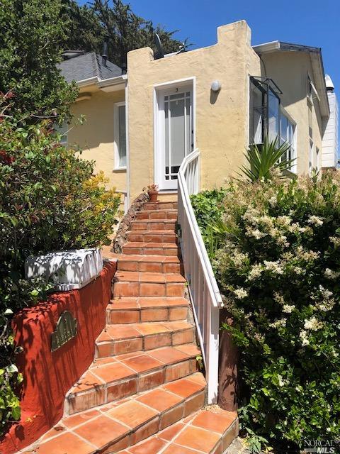 2 Lower Crescent Avenue, Unit 1 Sausalito, CA 94965 - Photo 1 of 1 a view of a backyard with large trees