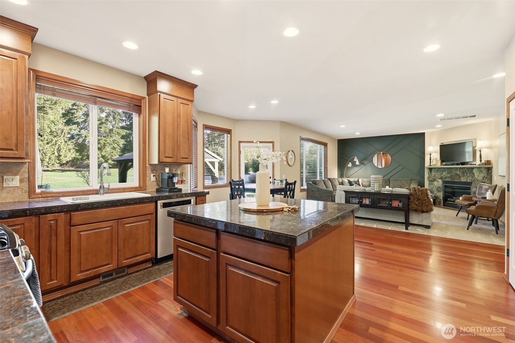 13621 3rd Street Southeast Snohomish, WA 98290 - Photo 11 of 38 a kitchen with lots of counter top space and living room