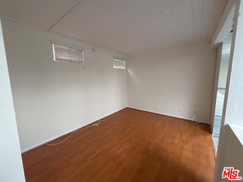 915 Broadway Street, Unit 2 Venice, CA 90291 - Photo 28 of 31 a view of empty room with wooden floor