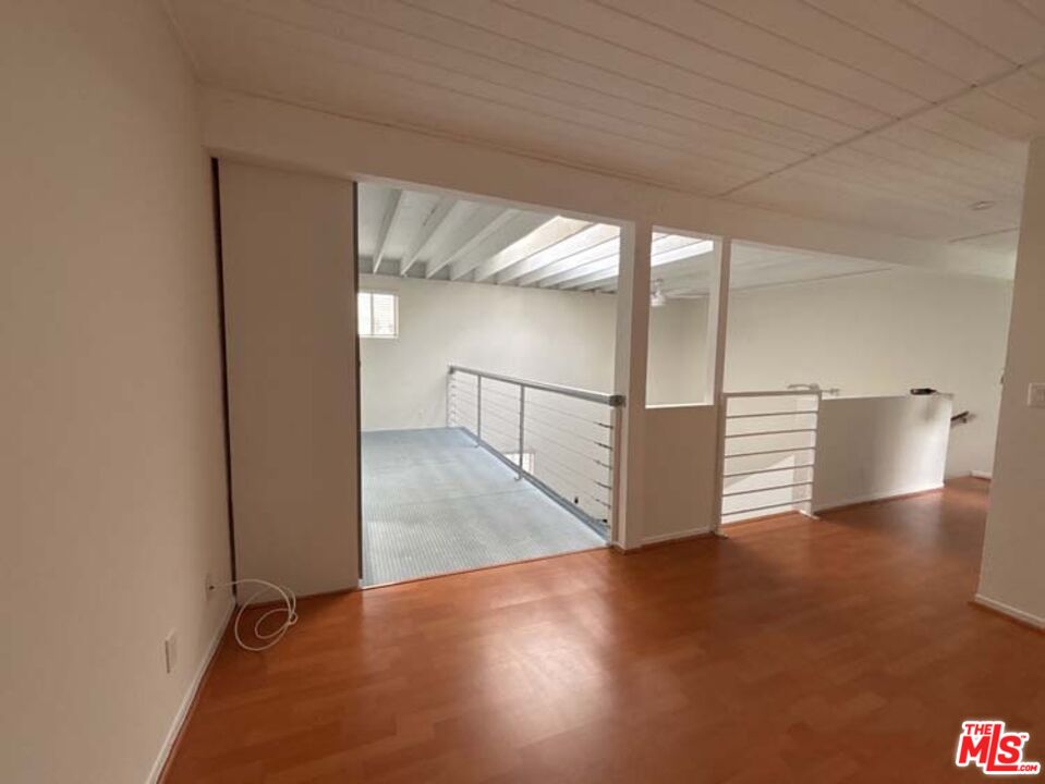 915 Broadway Street, Unit 2 Venice, CA 90291 - Photo 29 of 31 a view of a hallway with wooden floor